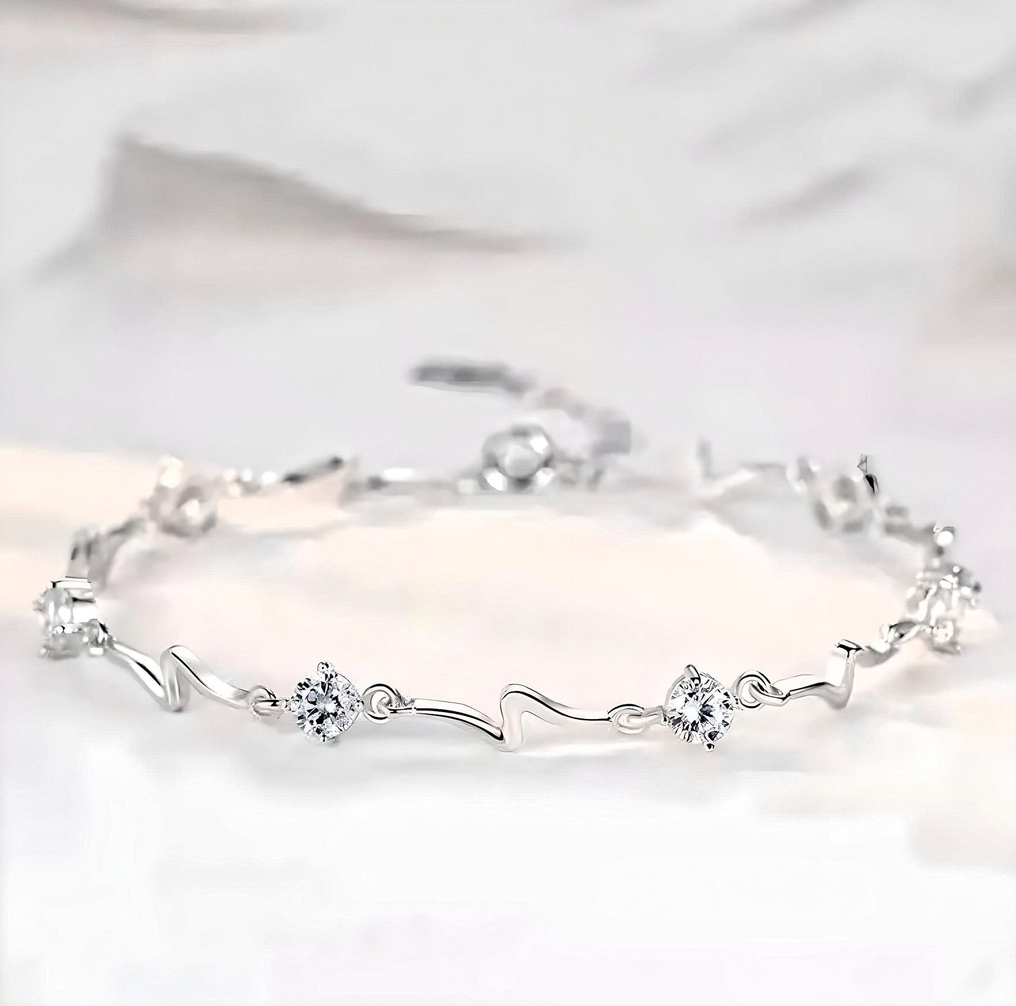 925 Sterling Silver Swirl Chain Bracelet with Clear Stones